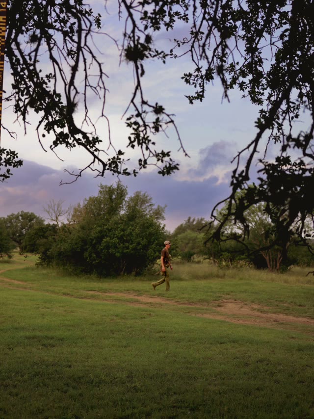 Walking a scouting trail at dusk